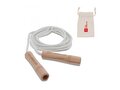 Jumping rope with wooden handles in a cotton pouch