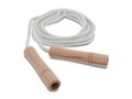 Jumping rope with wooden handles in a cotton pouch