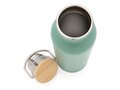 Modern stainless steel bottle with bamboo lid 12