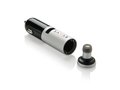 Car charger with integrated wireless earbud 7