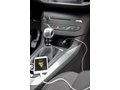 Car charger with integrated wireless earbud 6