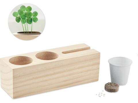 Wooden desk stand with clover seeds