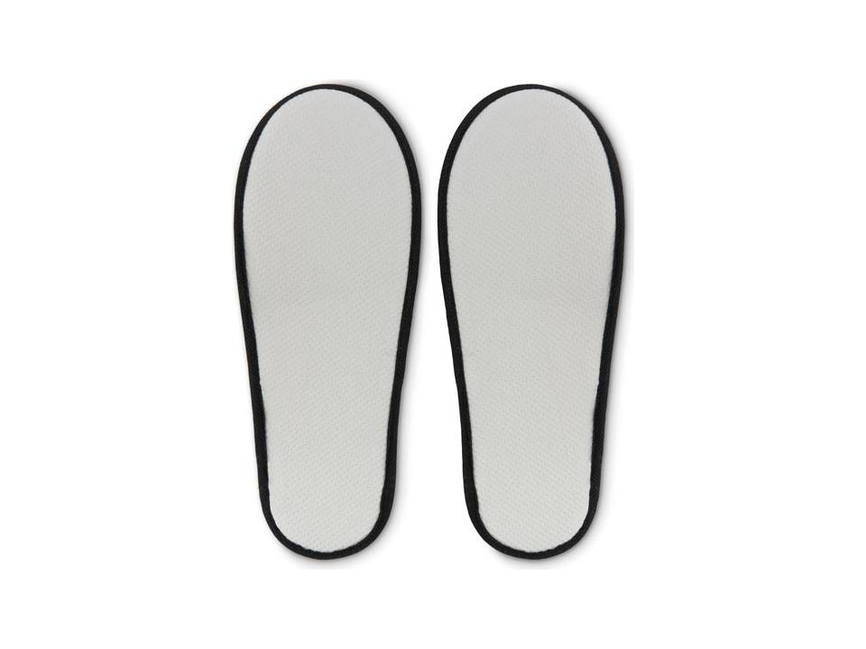 Chaussons d'hôtel dans une pochette 1