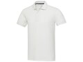 Emerald unisex Aware™ gerecyclede polo met korte mouwen